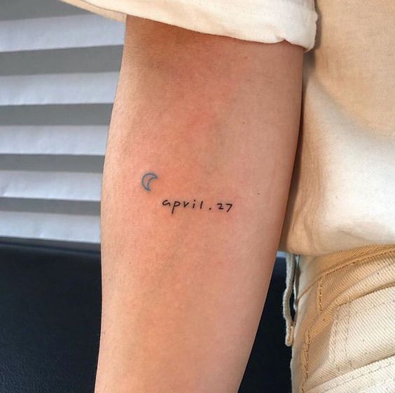 date tattoo with letters and number