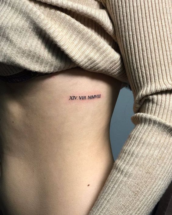 rib date tattoo