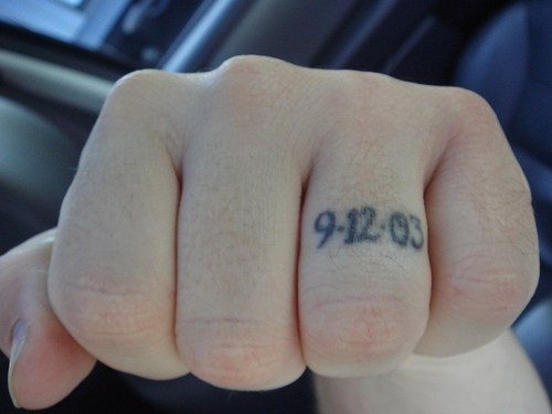 530 joint finger tattoo