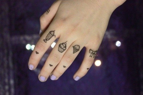 31 photo finger tattoo