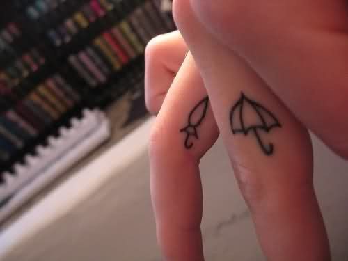 42 photo finger tattoo