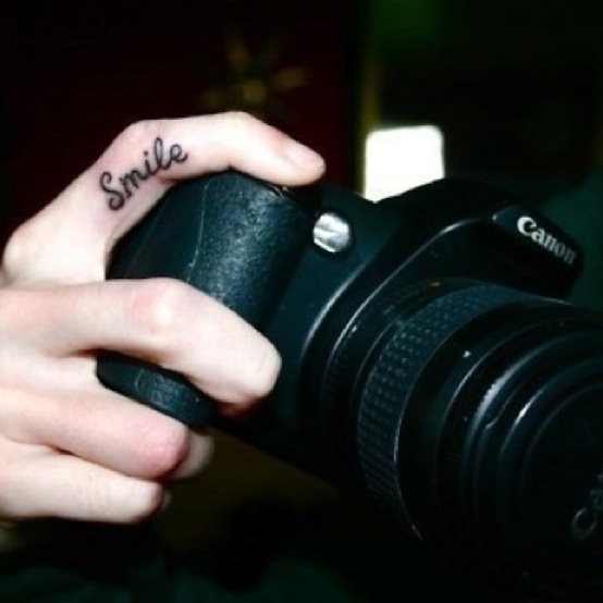 11 photo finger tattoo