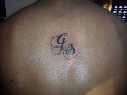 initial tattoo 18