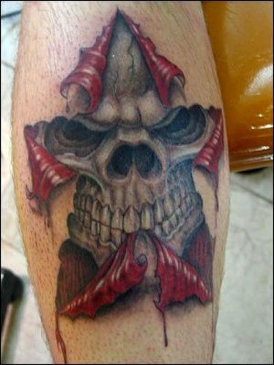 This tattoo shows the torn skin from which the face of a skull comes out