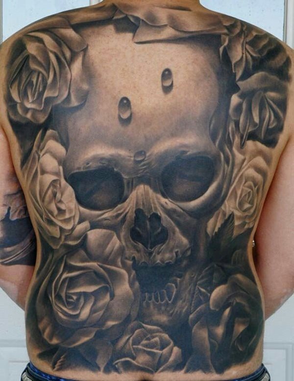 Another great design of a skull that covers the entire back surrounded by large roses in black shaded tones