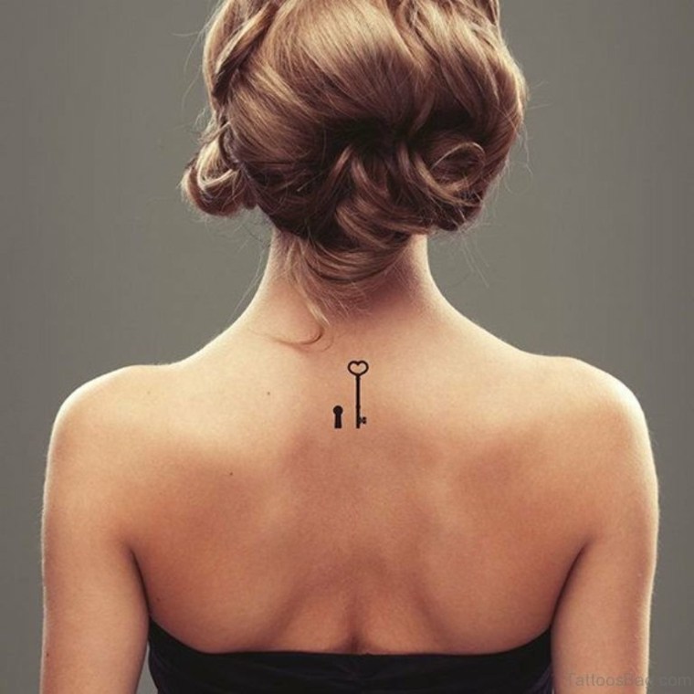 small tattoos-keys-women-back