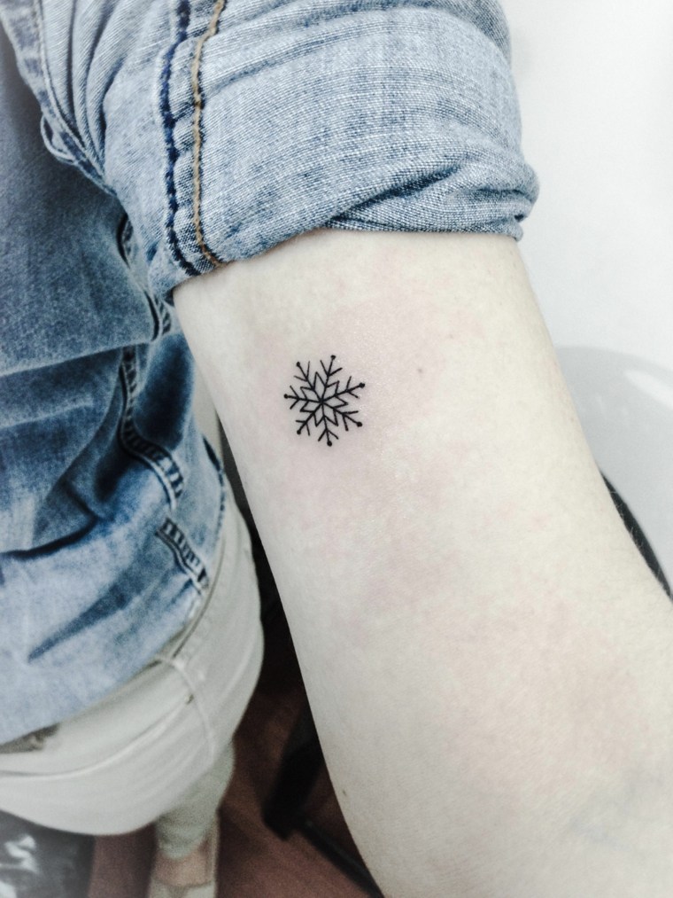 simple tattoos-arm-snowflakes