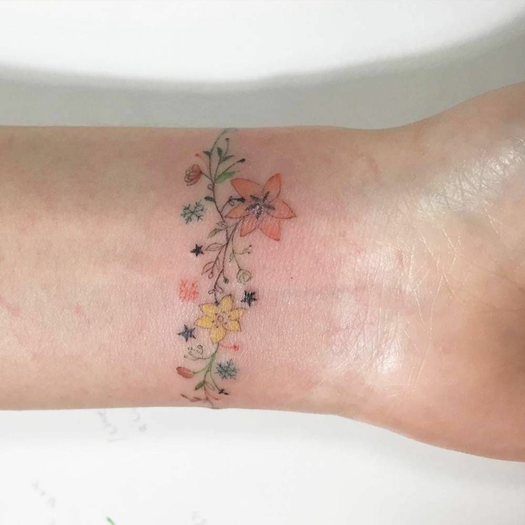 flower tattoo on the wrist