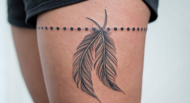 tattoo-leg-dots-feathers