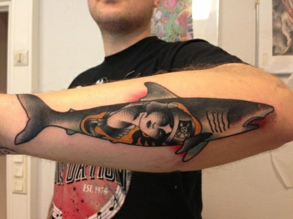 model 114 forearm tattoo