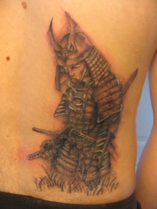 Tattoo on the side of the back