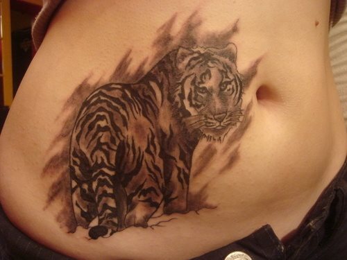 This girl wears a tiger made with black ink on her abdomen