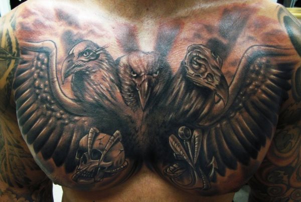 Tattoo on the chest of an eagle with three head and in one of its claws it has a caravel, a peculiar tattoo, where originality prevails and that has resulted in a very impressive and good appearance