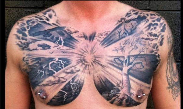 Tatauje of a sun with sparkles, in which black and white flashes have been painted around clouds, trees with small leaves, thunder and rain, a peculiar tattoo that we like quite a bit except for the finish under the chest, too curved for the breasts of a man