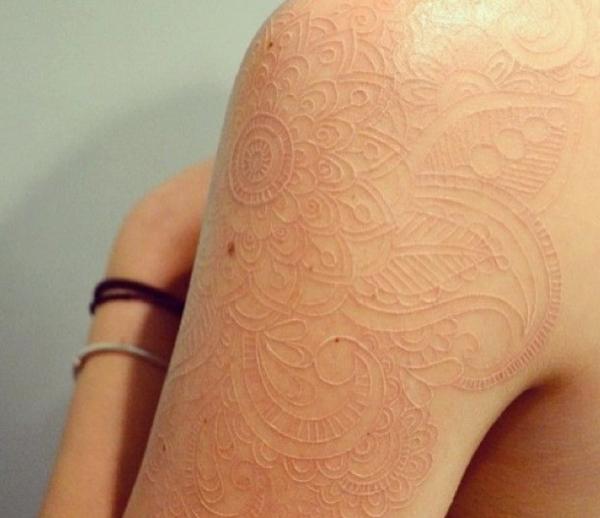 What are scarification tattoos